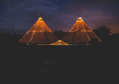 Tipis at night